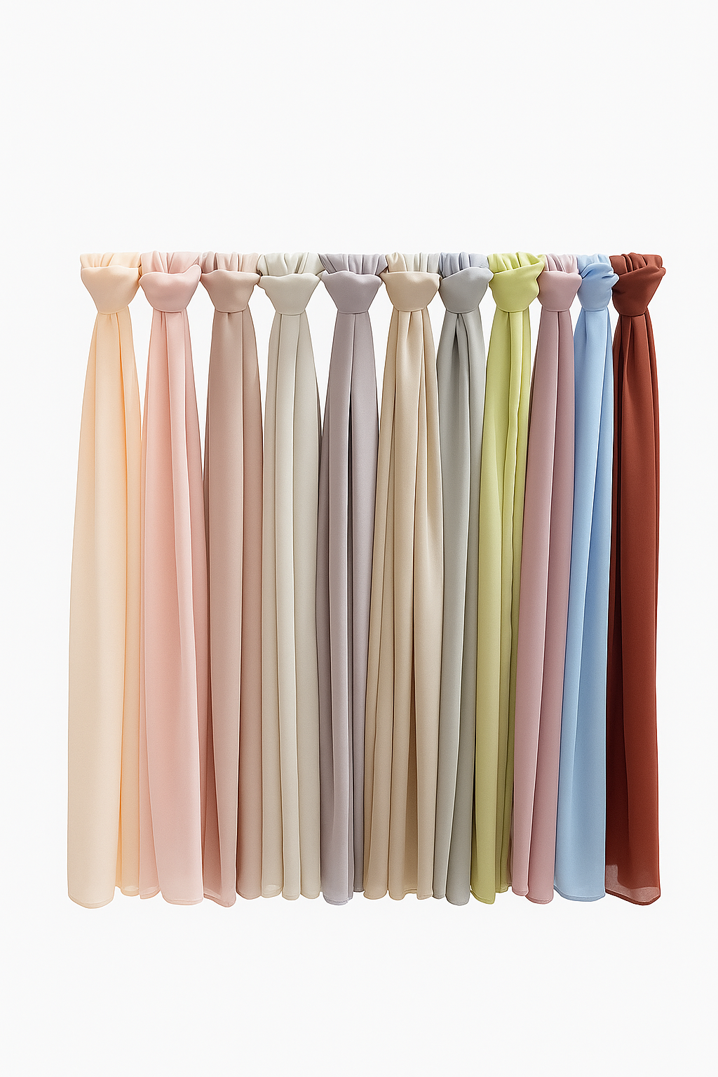 Chiffon hijabs in multiple colours neatly arranged, showcasing lightweight and flowy chiffon fabric options