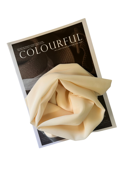 Cream chiffon hijab close-up – flowy and elegant texture